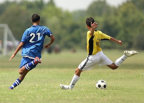 Jogadores de Futebol Treinando