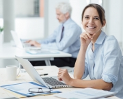 Smiling business woman at work